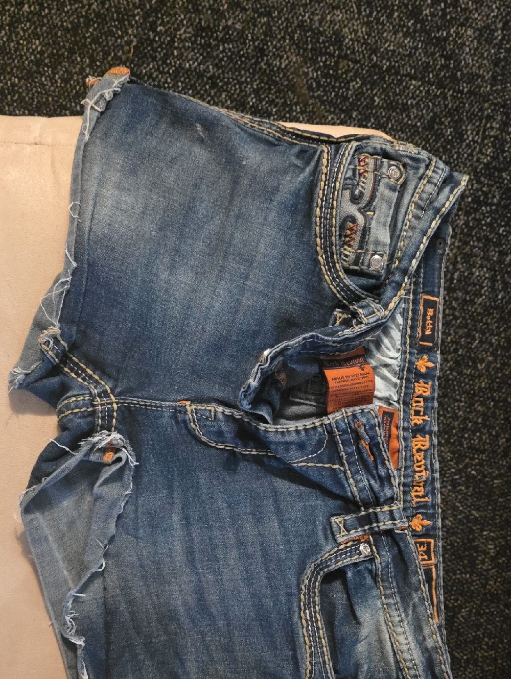 Rock Revival Women's Blue Distressed Denim Shorts with Embroidered Waistband